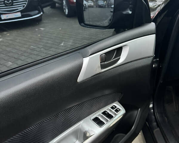 Черный Субару Форестер, объемом двигателя 1.99 л и пробегом 180 тыс. км за 7200 $, фото 5 на Automoto.ua