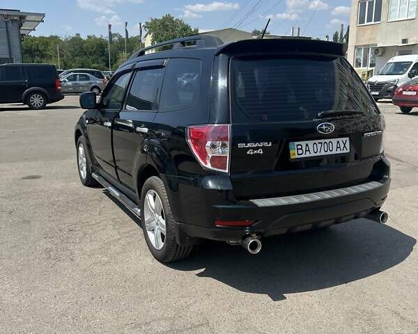 Черный Субару Форестер, объемом двигателя 1.99 л и пробегом 176 тыс. км за 9300 $, фото 4 на Automoto.ua