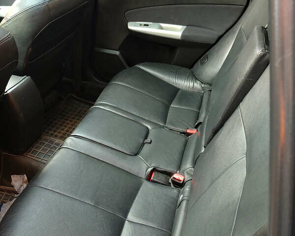 Субару Форестер 2010 в Сокале на Automoto.ua Черный Субару Форестер, объемом двигателя 2 л и пробегом 223 тыс. км за 5500 $, фото 12 на Automoto.ua