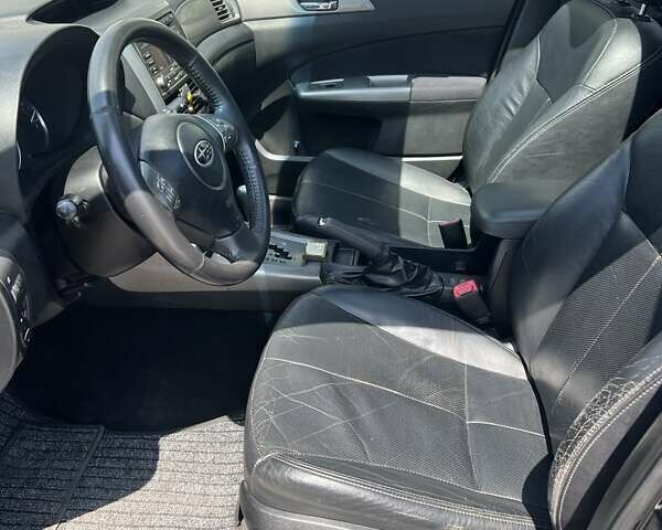 Черный Субару Форестер, объемом двигателя 1.99 л и пробегом 176 тыс. км за 9300 $, фото 7 на Automoto.ua