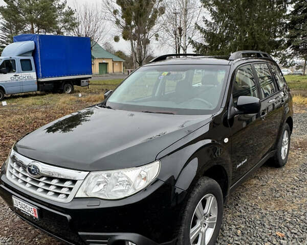 Черный Субару Форестер, объемом двигателя 1.99 л и пробегом 225 тыс. км за 9300 $, фото 2 на Automoto.ua