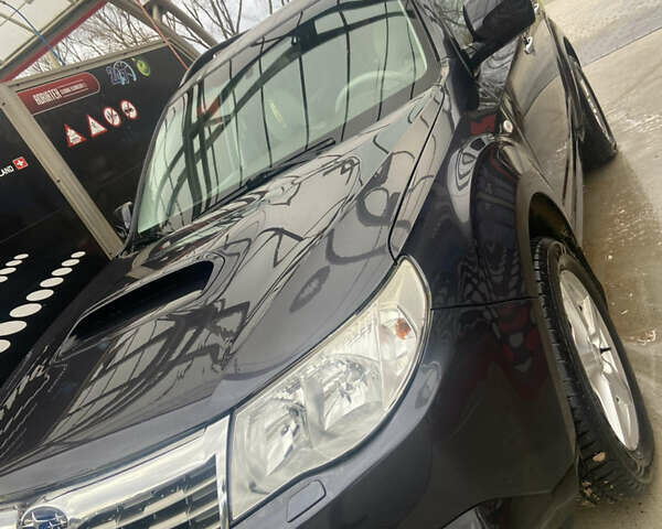 Чорний Субару Forester, об'ємом двигуна 1.99 л та пробігом 125 тис. км за 9777 $, фото 7 на Automoto.ua