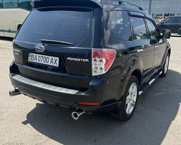 Черный Субару Форестер, объемом двигателя 1.99 л и пробегом 176 тыс. км за 9300 $, фото 3 на Automoto.ua