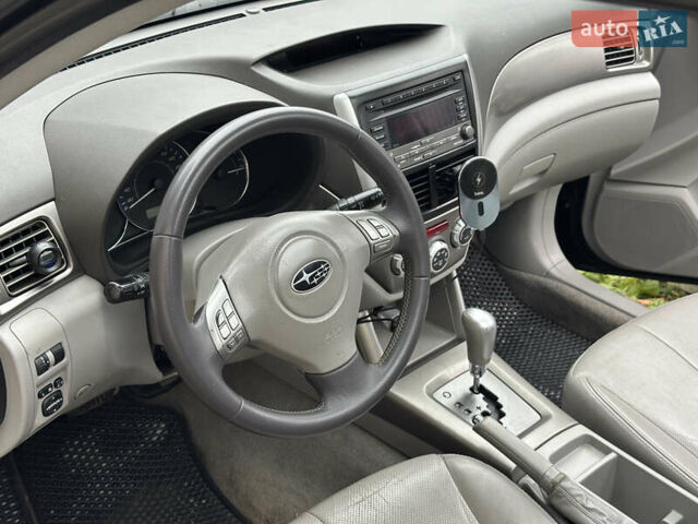 Черный Субару Форестер, объемом двигателя 1.99 л и пробегом 330 тыс. км за 7600 $, фото 9 на Automoto.ua