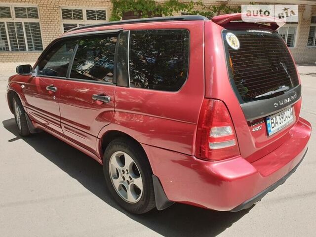 Червоний Субару Forester, об'ємом двигуна 2 л та пробігом 197 тис. км за 6677 $, фото 7 на Automoto.ua