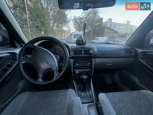 Красный Субару Форестер, объемом двигателя 2 л и пробегом 185 тыс. км за 2400 $, фото 13 на Automoto.ua
