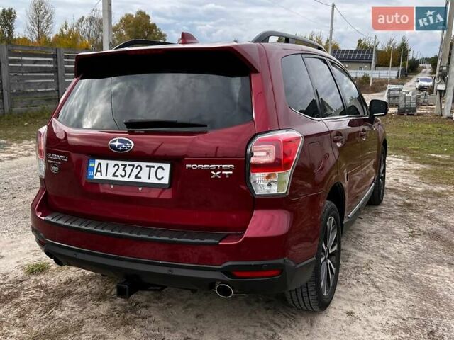 Красный Субару Форестер, объемом двигателя 2 л и пробегом 132 тыс. км за 15000 $, фото 3 на Automoto.ua