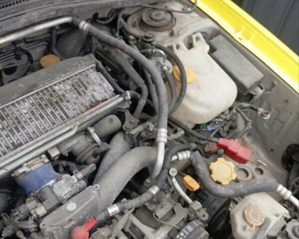 Желтый Субару Форестер, объемом двигателя 2 л и пробегом 250 тыс. км за 6000 $, фото 7 на Automoto.ua