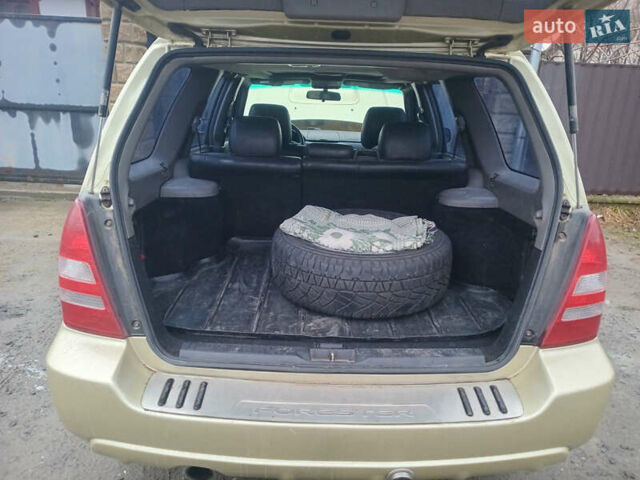 Субару Форестер 2004 в Владимирце на Automoto.ua Желтый Субару Форестер, объемом двигателя 2 л и пробегом 360 тыс. км за 4000 $, фото 7 на Automoto.ua