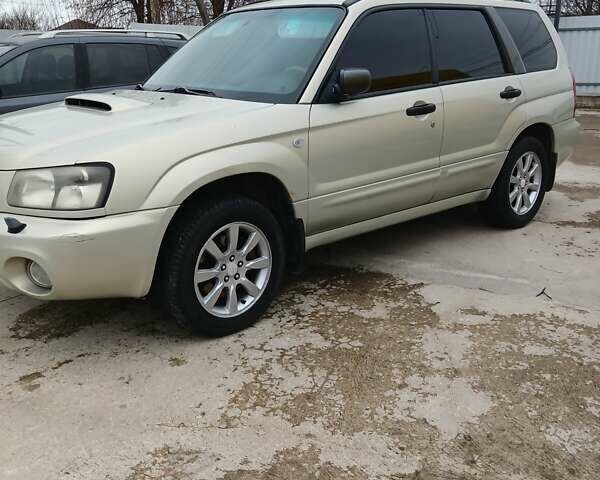 Желтый Субару Форестер, объемом двигателя 2 л и пробегом 320 тыс. км за 5000 $, фото 1 на Automoto.ua