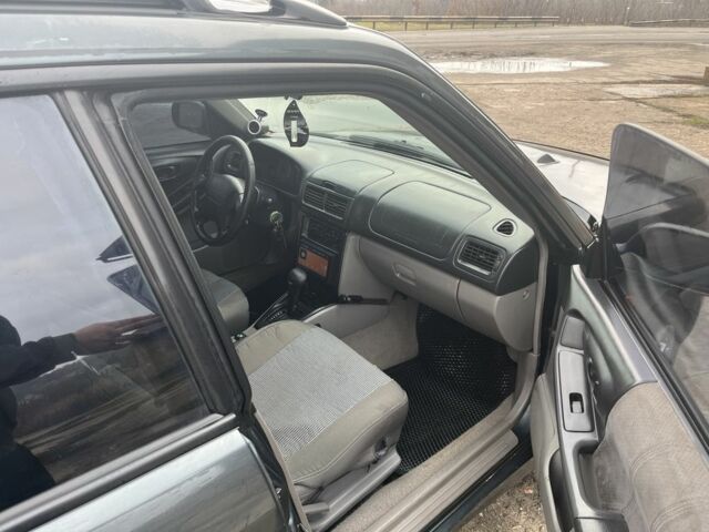 Серый Субару Форестер, объемом двигателя 2 л и пробегом 350 тыс. км за 4500 $, фото 12 на Automoto.ua