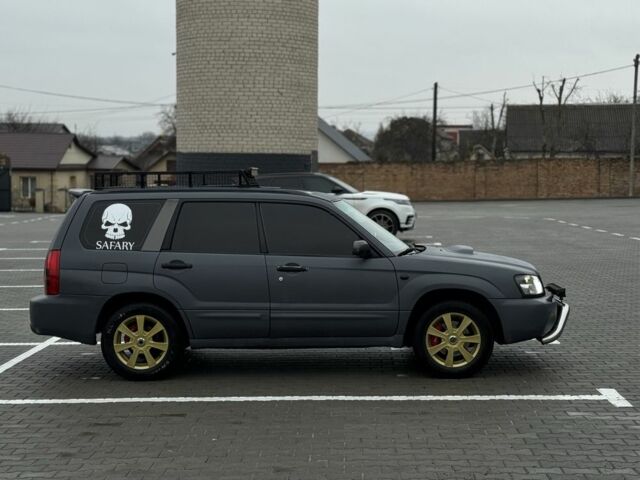 Серый Субару Форестер, объемом двигателя 2.5 л и пробегом 255 тыс. км за 6600 $, фото 6 на Automoto.ua