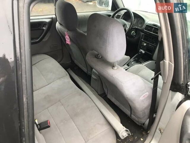 Сірий Субару Forester, об'ємом двигуна 2 л та пробігом 205 тис. км за 4500 $, фото 4 на Automoto.ua