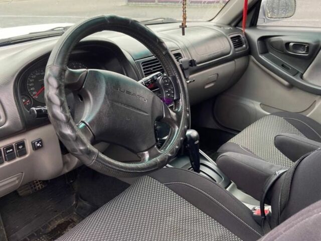 Серый Субару Форестер, объемом двигателя 2 л и пробегом 325 тыс. км за 4400 $, фото 2 на Automoto.ua