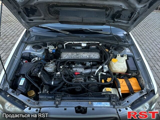 Серый Субару Форестер, объемом двигателя 2 л и пробегом 170 тыс. км за 6500 $, фото 5 на Automoto.ua