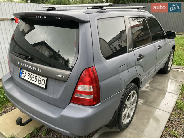 Серый Субару Форестер, объемом двигателя 1.99 л и пробегом 144 тыс. км за 5998 $, фото 2 на Automoto.ua