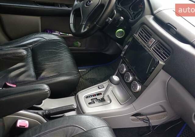 Серый Субару Форестер, объемом двигателя 2 л и пробегом 231 тыс. км за 5500 $, фото 5 на Automoto.ua