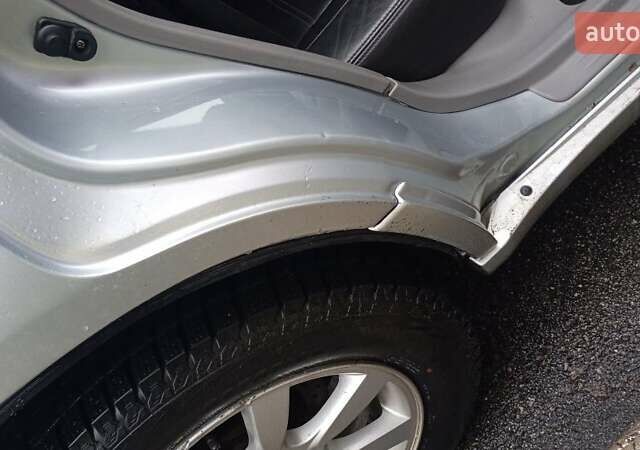 Серый Субару Форестер, объемом двигателя 2 л и пробегом 231 тыс. км за 5500 $, фото 6 на Automoto.ua