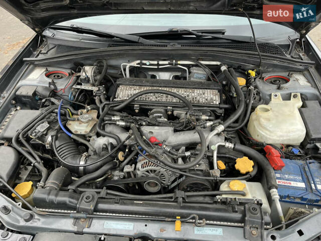 Серый Субару Форестер, объемом двигателя 2 л и пробегом 450 тыс. км за 4799 $, фото 8 на Automoto.ua
