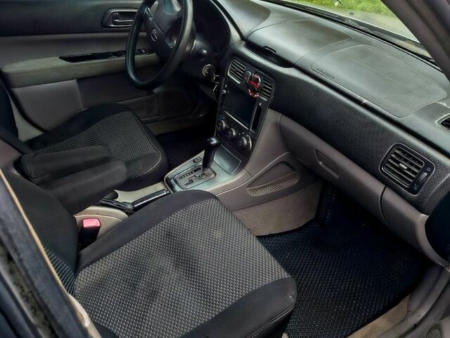 Субару Forester 2004 у Сумах на Automoto.ua Сірий Субару Forester, об'ємом двигуна 2 л та пробігом 200 тис. км за 4950 $, фото 6 на Automoto.ua
