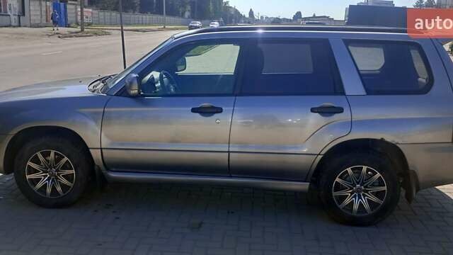 Серый Субару Форестер, объемом двигателя 1.99 л и пробегом 295 тыс. км за 5400 $, фото 2 на Automoto.ua