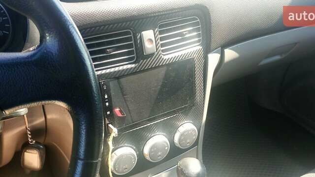 Серый Субару Форестер, объемом двигателя 1.99 л и пробегом 295 тыс. км за 5400 $, фото 3 на Automoto.ua