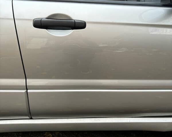 Серый Субару Форестер, объемом двигателя 2.46 л и пробегом 241 тыс. км за 7600 $, фото 11 на Automoto.ua