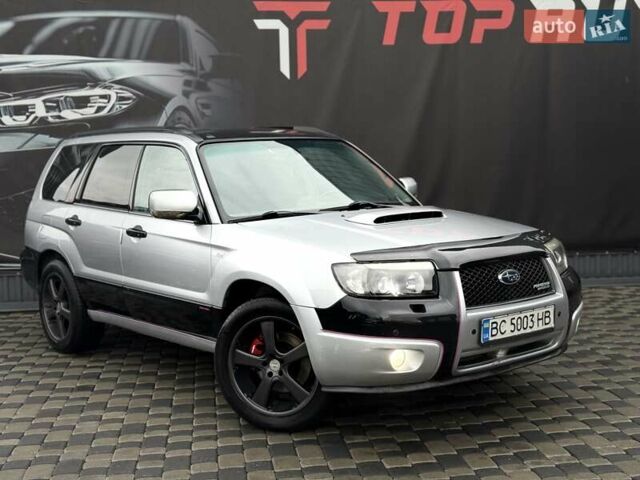 Серый Субару Форестер, объемом двигателя 2 л и пробегом 281 тыс. км за 5600 $, фото 7 на Automoto.ua