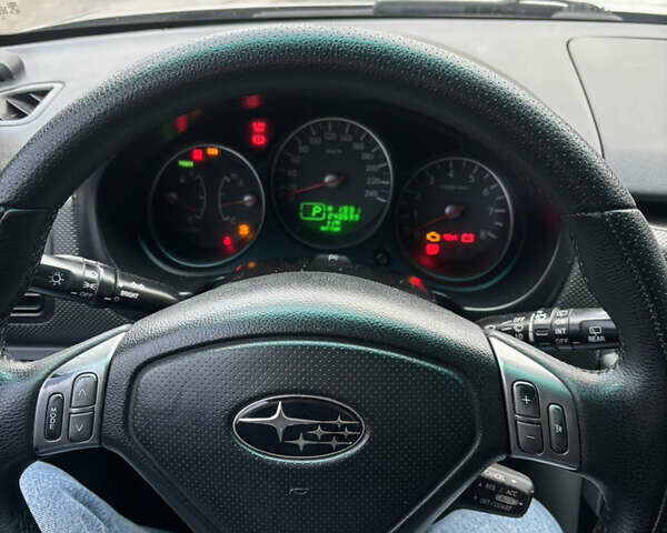 Серый Субару Форестер, объемом двигателя 2.46 л и пробегом 241 тыс. км за 7600 $, фото 7 на Automoto.ua