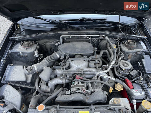 Серый Субару Форестер, объемом двигателя 2 л и пробегом 239 тыс. км за 5800 $, фото 16 на Automoto.ua