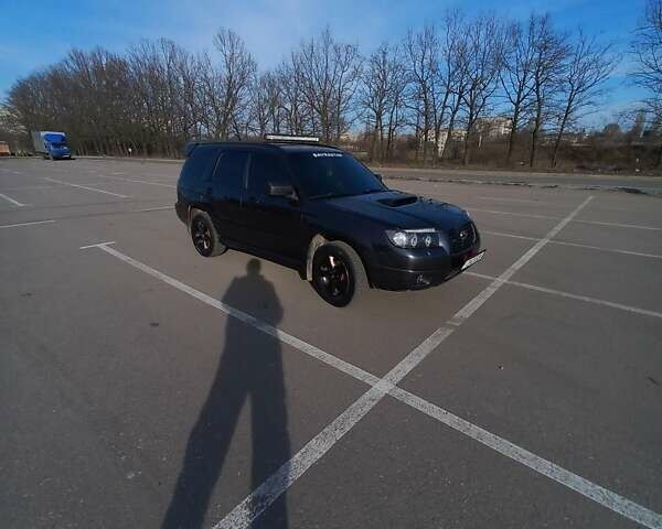 Сірий Субару Forester, об'ємом двигуна 1.99 л та пробігом 255 тис. км за 8000 $, фото 7 на Automoto.ua