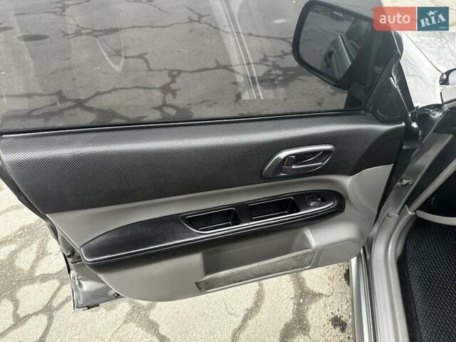 Серый Субару Форестер, объемом двигателя 2 л и пробегом 370 тыс. км за 4000 $, фото 7 на Automoto.ua