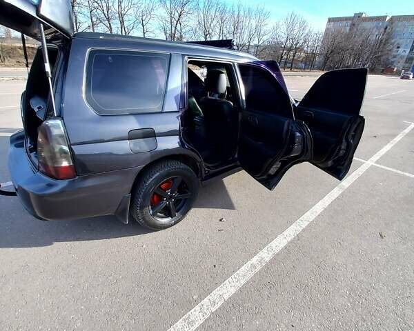 Сірий Субару Forester, об'ємом двигуна 1.99 л та пробігом 255 тис. км за 8000 $, фото 4 на Automoto.ua