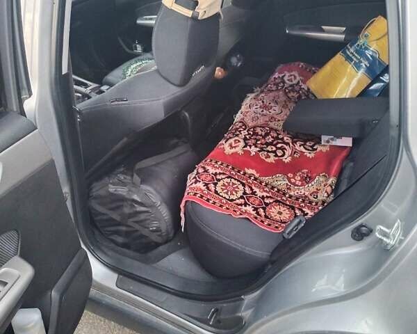 Серый Субару Форестер, объемом двигателя 1.99 л и пробегом 309 тыс. км за 7700 $, фото 6 на Automoto.ua