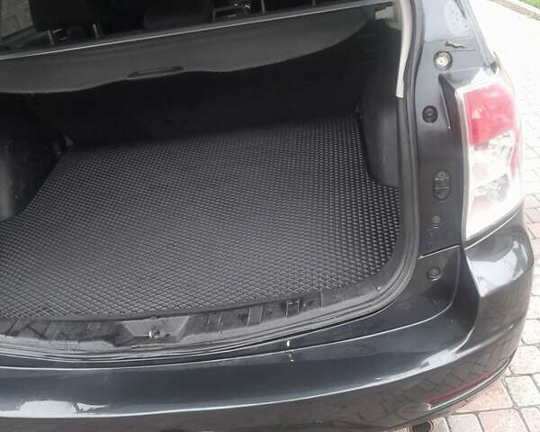 Серый Субару Форестер, объемом двигателя 1.99 л и пробегом 209 тыс. км за 7700 $, фото 9 на Automoto.ua