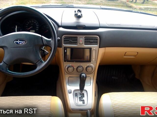 Синий Субару Форестер, объемом двигателя 2.5 л и пробегом 259 тыс. км за 4400 $, фото 6 на Automoto.ua