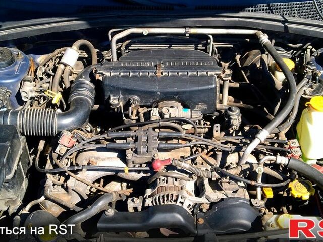 Синий Субару Форестер, объемом двигателя 2.5 л и пробегом 259 тыс. км за 4400 $, фото 11 на Automoto.ua