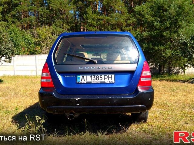Синий Субару Форестер, объемом двигателя 2.5 л и пробегом 259 тыс. км за 4400 $, фото 2 на Automoto.ua