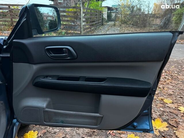 Синій Субару Forester, об'ємом двигуна 2 л та пробігом 382 тис. км за 5490 $, фото 24 на Automoto.ua
