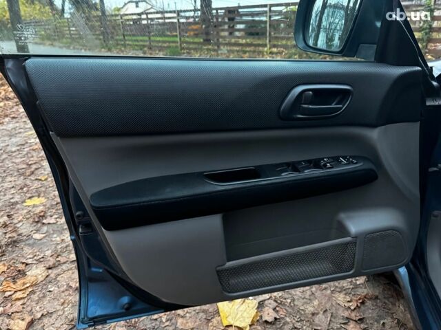 Синій Субару Forester, об'ємом двигуна 2 л та пробігом 382 тис. км за 5490 $, фото 9 на Automoto.ua