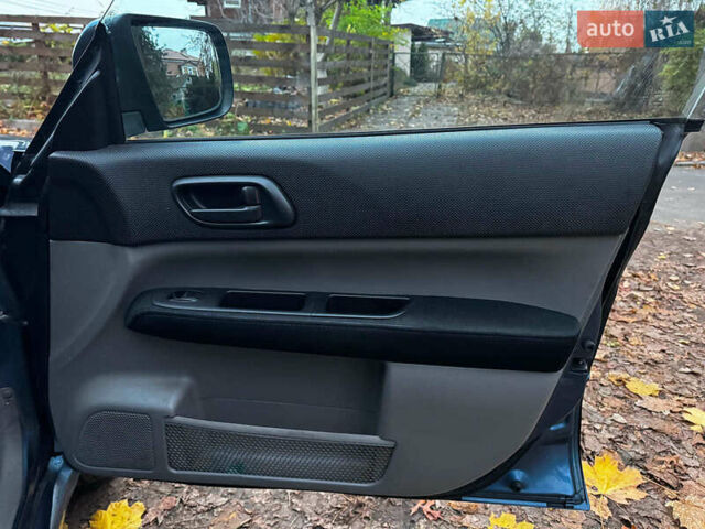 Синий Субару Форестер, объемом двигателя 2 л и пробегом 382 тыс. км за 5490 $, фото 24 на Automoto.ua