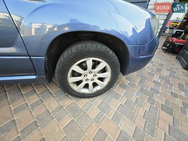 Синій Субару Forester, об'ємом двигуна 2 л та пробігом 330 тис. км за 8000 $, фото 20 на Automoto.ua