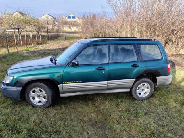 Зелений Субару Forester, об'ємом двигуна 2 л та пробігом 350 тис. км за 1736 $, фото 6 на Automoto.ua