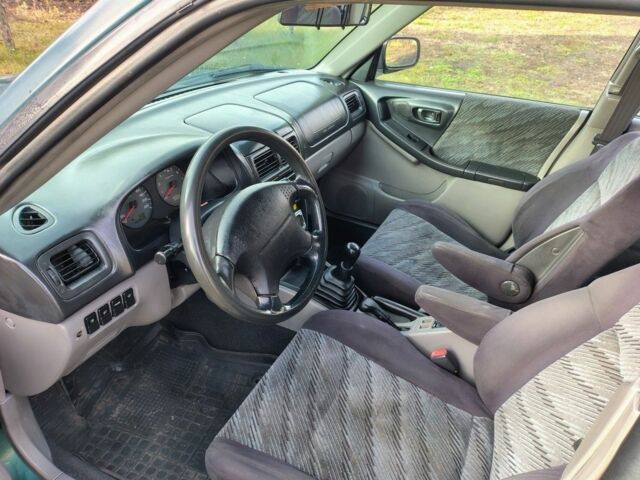 Зелений Субару Forester, об'ємом двигуна 2 л та пробігом 350 тис. км за 1736 $, фото 2 на Automoto.ua