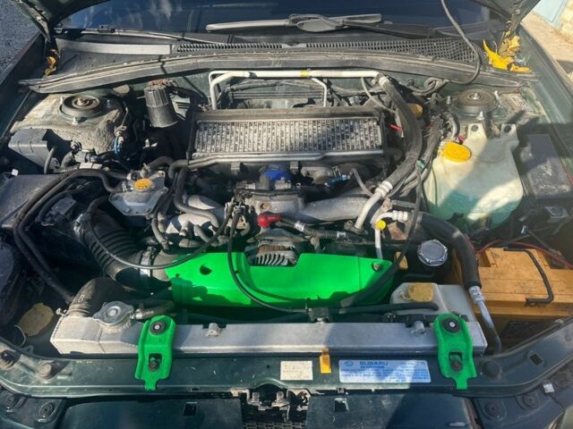 Зелений Субару Forester, об'ємом двигуна 2 л та пробігом 250 тис. км за 5500 $, фото 4 на Automoto.ua