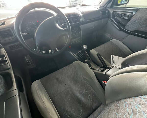 Зелений Субару Forester, об'ємом двигуна 2 л та пробігом 427 тис. км за 4200 $, фото 14 на Automoto.ua