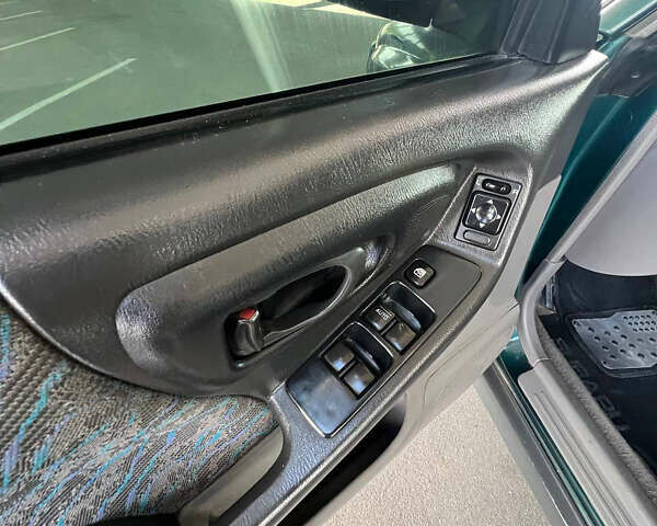 Зелений Субару Forester, об'ємом двигуна 2 л та пробігом 427 тис. км за 4200 $, фото 15 на Automoto.ua