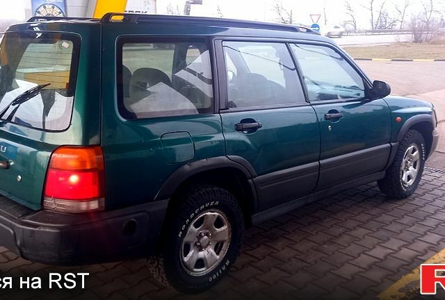 Зелений Субару Forester, об'ємом двигуна 2 л та пробігом 300 тис. км за 4450 $, фото 4 на Automoto.ua