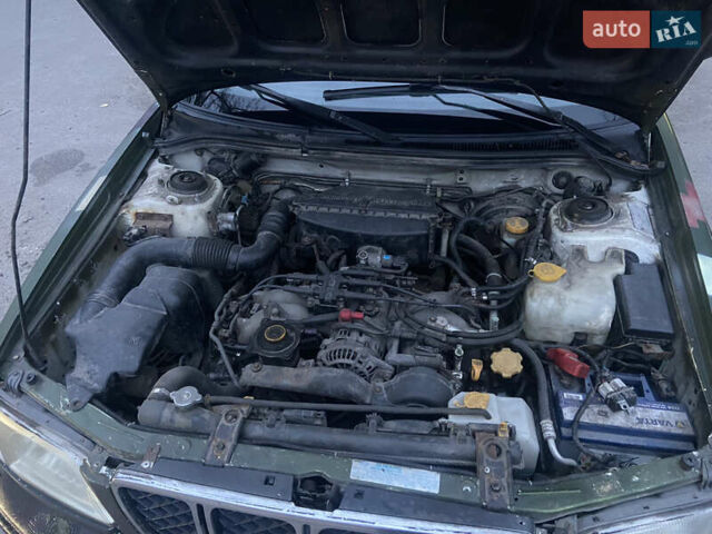 Зеленый Субару Форестер, объемом двигателя 2.5 л и пробегом 250 тыс. км за 4000 $, фото 7 на Automoto.ua