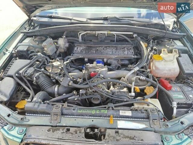 Зелений Субару Forester, об'ємом двигуна 2 л та пробігом 255 тис. км за 4500 $, фото 4 на Automoto.ua
